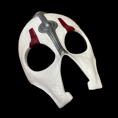 White Darth Nihilus mask with red and gray accents on a surface